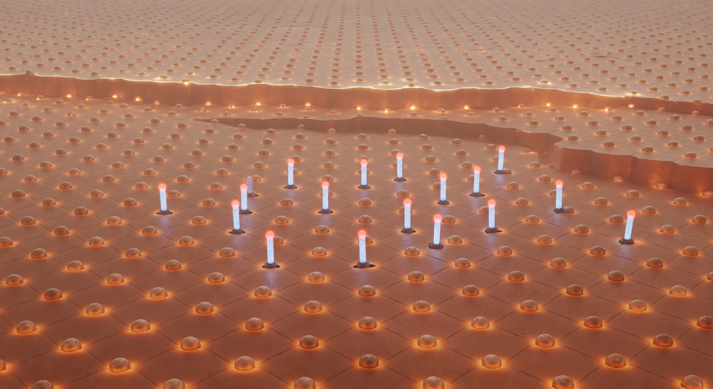 The viewer stands at the level of the copper surface itself, gazing across a vast hexagonal plain of reddish-gold atomic spheres packed in the close-packed Cu(111) arrangement, each atom glowing with warm amber luminescence from its pooled electron density, the gentle corrugation of the lattice rolling away toward a single-atom-height step edge in the middle distance whose ledge atoms burn fractionally brighter — their reduced coordination raising the local density of states like a bioluminescent reef fringe. Scattered across this metallic floor, a handful of carbon monoxide molecules stand upright on copper atop-sites like slender obelisks: a compact dark-gray carbon base bonded to the surface through its carbon end, above it a dense cylindrical column of triple-bond electron density, capped by a vivid crimson oxygen apex whose lone-pair clouds form softly glowing lobes at the summit. These molecular towers have been placed here deliberately, one by one, by the tip of a scanning tunneling microscope operating at cryogenic temperatures — a process of atom manipulation that exploits the tip's electric field to slide adsorbates across the surface with sub-ångström precision, encoding geometric patterns into an otherwise featureless terrace. A diffuse quantum haze of electron density lingers above the copper like a ground-level fog, its color shifting from warm amber over bare metal to cool blue-white where the CO molecules concentrate their π-bonding orbitals, the entire scene self-illuminated by the surface's own electronic structure with no external light source needed.